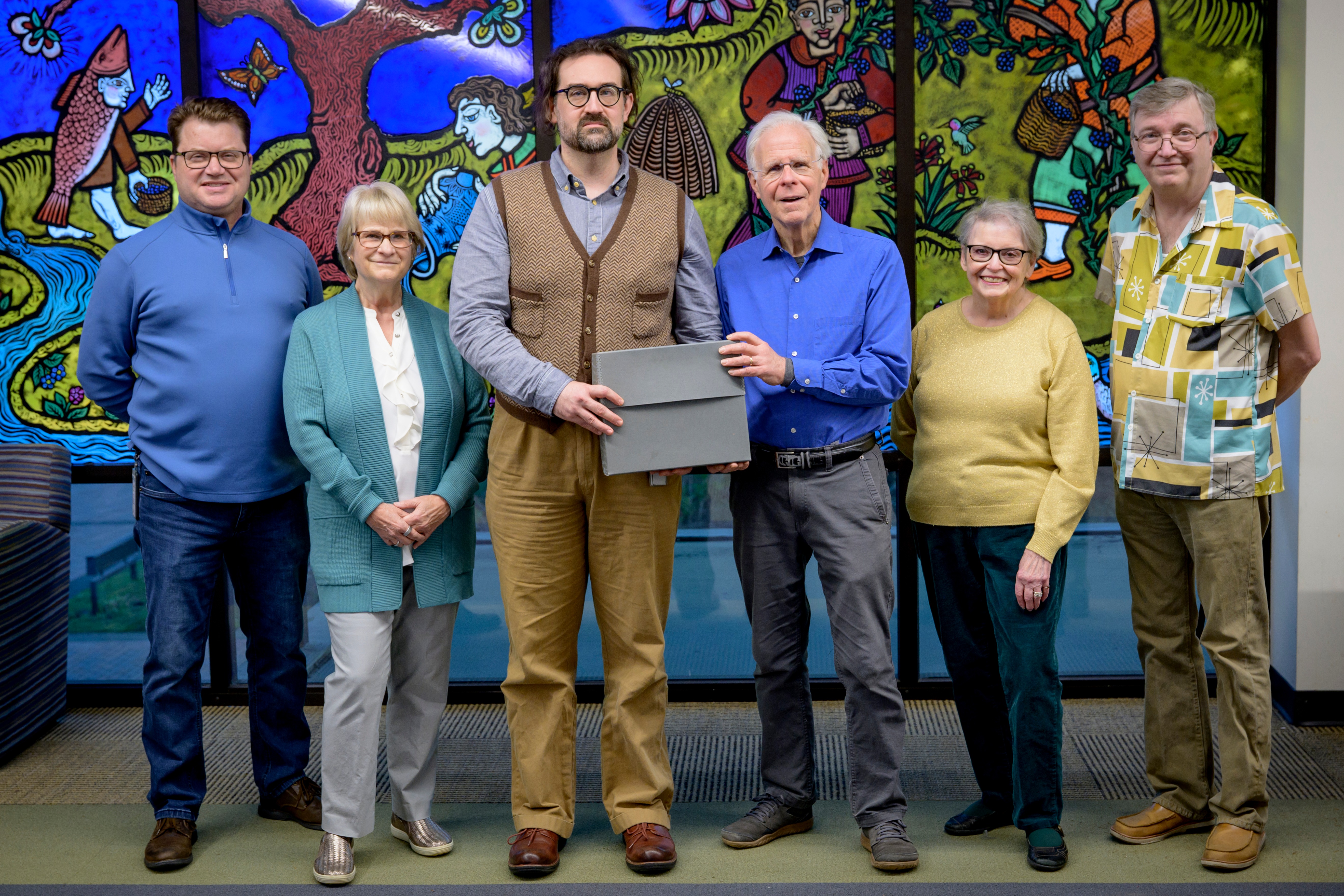 OHS and Evergreen College Archivist Grant Mandarino pose for a photo marking the occasion