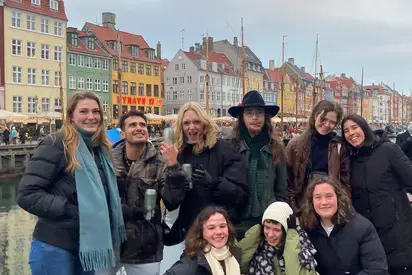 aiden gumear in Copenhagen with a group of students