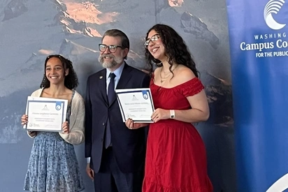 Maria and Alauna receiving awards at the Governor's Ball