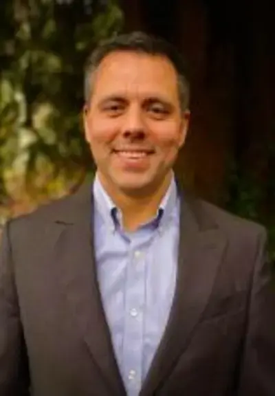 Headshot of Kris Peters, Board of Trustee member