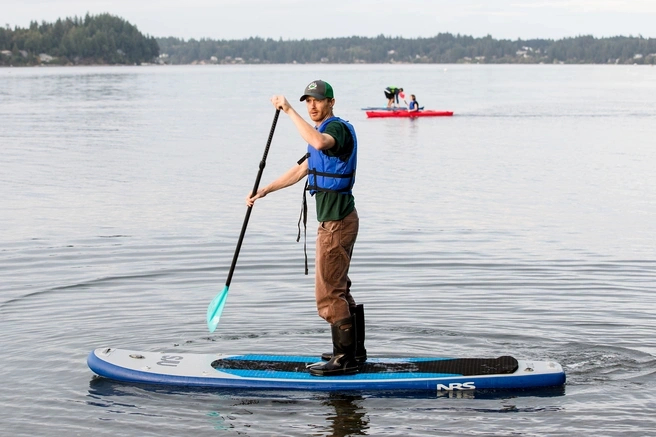 Person paddleboarding on the Sound