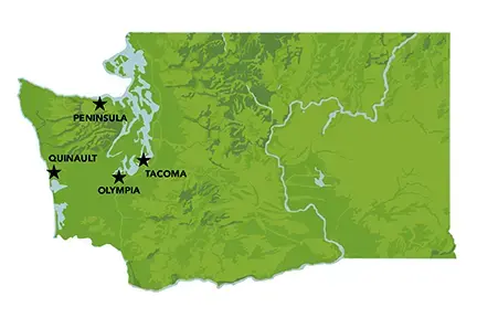 A green map of WA state with NPP sites marked with stars